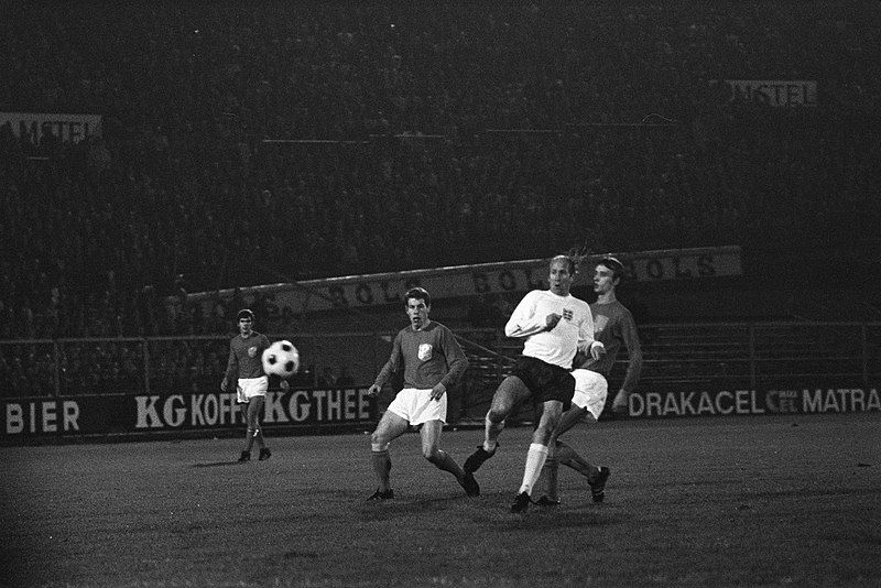 bobby charlton playing for england in 1969 taking a shot